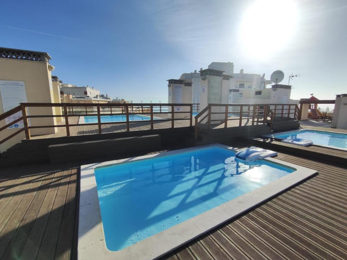 Armacao De Pera Ocean Terrace With Pool By Homing Apartment Bagian luar foto